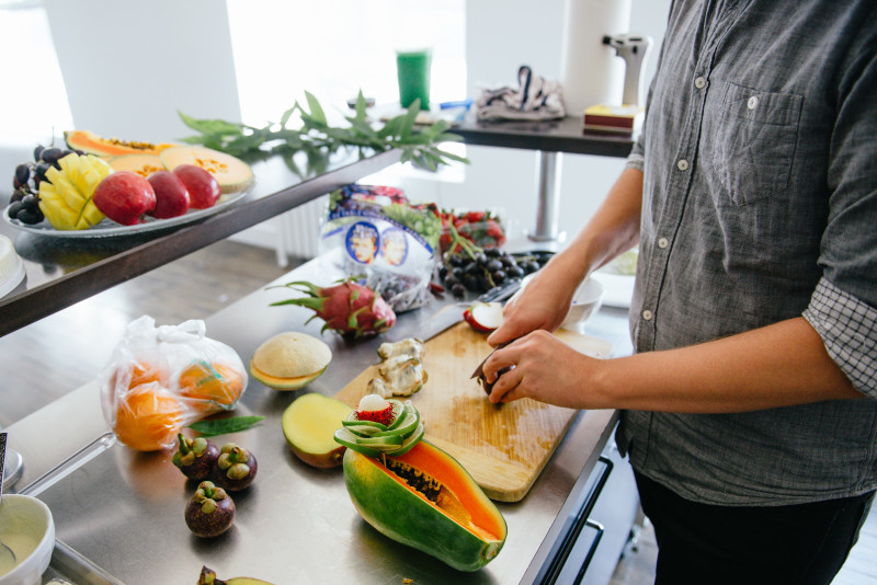 John prepping the fruit salad