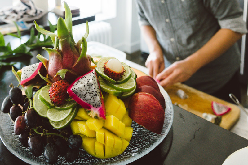 Arranging exotic fruit platter