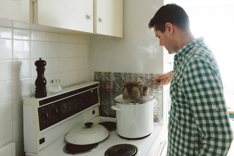 Chef cooking octopus